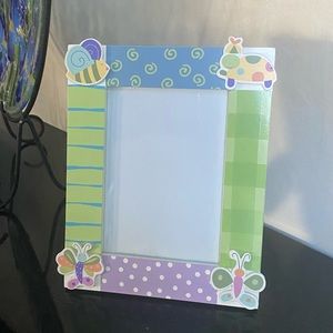 Baby Butterfly frame holds 5x7 photo.